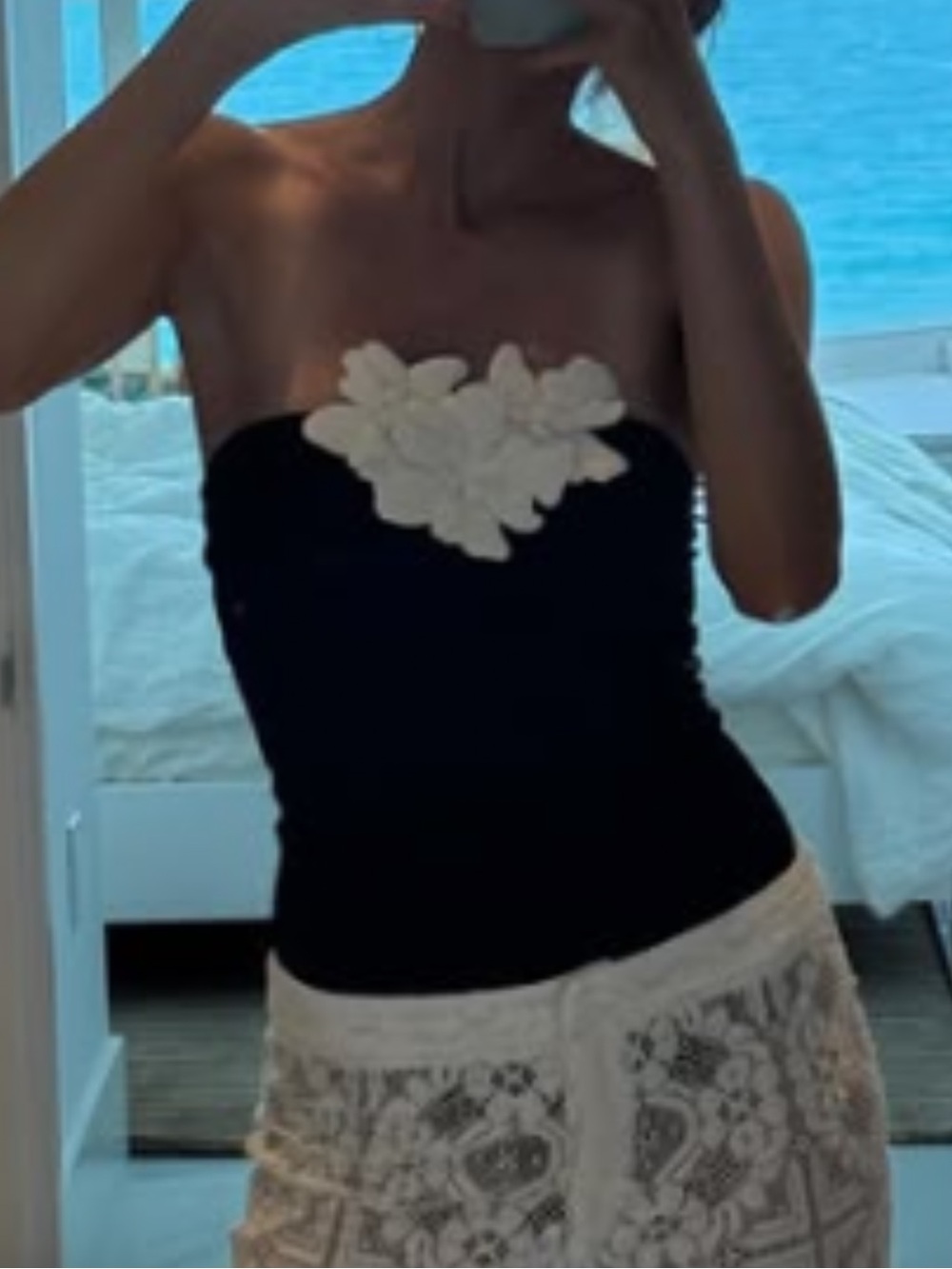 Black One-Piece Swimsuit with White Floral Applique